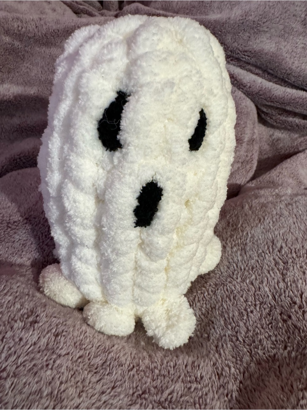 Stuffed ghost for Halloween. Approximately 7” tall.